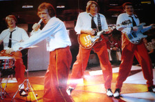 Ein Racey Poster für 70er