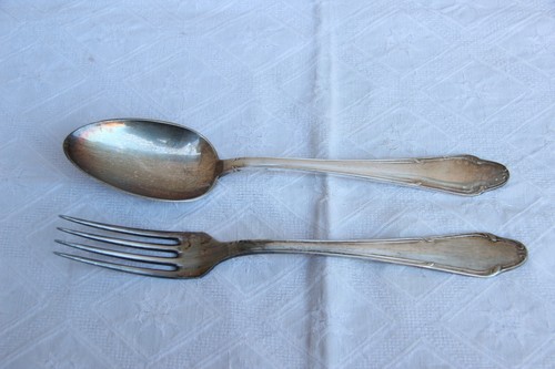 Antica coppia posate da - di,