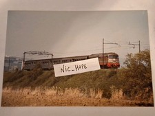 Fotografia Locomotore Diesel FS D 342.401... in testa ad un convoglio passeggeri