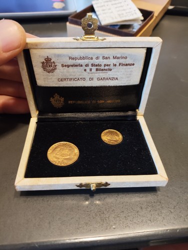 Monete oro san - di, –