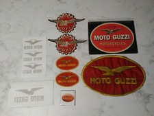 MOTO GUZZI LOTTO TOPPE.CALAMITA.TARGA METALLO NUOVA