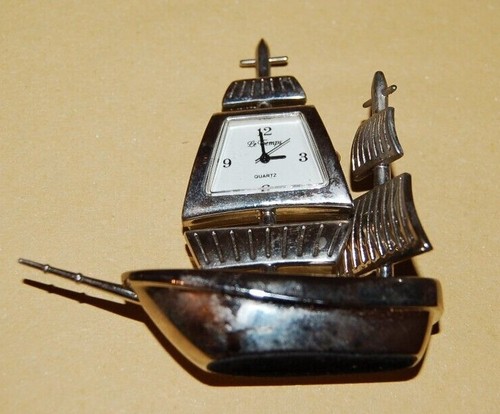 Orologio tavolo forma di - da, a