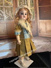 Antica bambola in porcellana