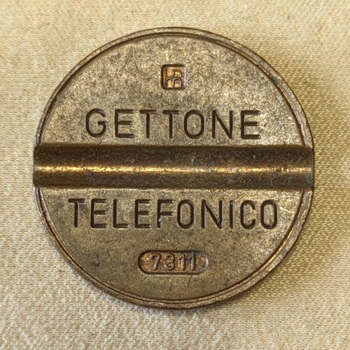 Gettone telefonico 7311 ipm - gettone,
