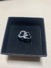 Anello con 2 cuori che si intrecciano (uno con brillanti)