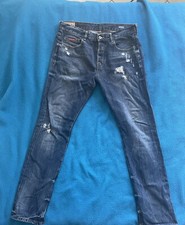 jeans uomo strappati