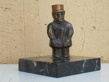 SCULTURA IN BRONZO DI FRANZ BORGHESE FIRMATA SU BASE IN MARMO NERO VENATO Leggi