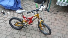 Bicicletta bambino gialla rossa ammortizzazione ruote 16 usata ottime condizioni