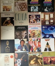 Lotto 50 dischi in vinile 33 giri Di Genere Vario + 1 Laser Disk