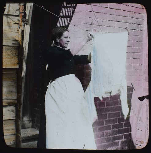 Woman hanging out washing - woman,