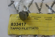 Exhaust manifold cap screw