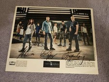 Terra Nova Cast foto firmata