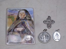 Lotto 4 pendenti cristiani