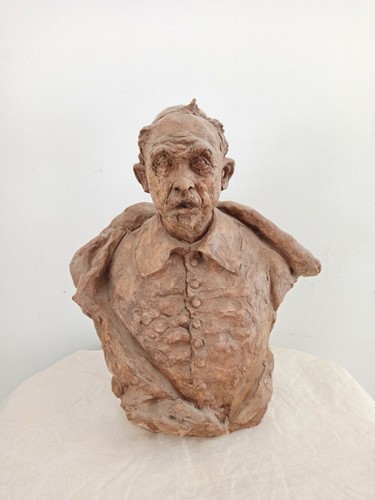 Scultura terracotta di - in,