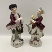 Coppia di piccole figurine