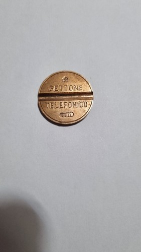 Gettone telefonico 7711 cmm - gettone,