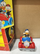 Politoys art.554 Auto di Paperino 1a serie "Colori invertiti" ruote in gomma.