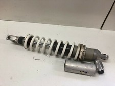 UN AMORTISSEUR ARRIERE MOTO