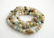 MALA IN PERLINE PIETRA NATURALE TESTA BUDDHA MEDITAZIONE YOGA BILANCIAMENTO OHM