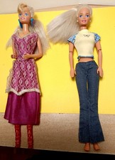 2 vecchie Barbie Anni 80/90 con vestiti e accessori vedi foto......