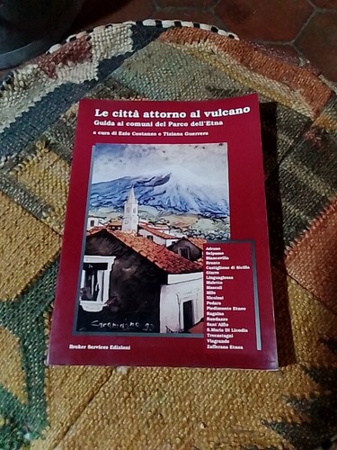 Città attorno vulcano - le,