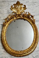 cornice ovale intagliata in