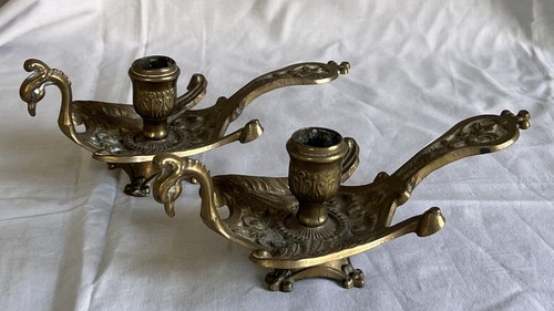 Coppia candelabri mano - di,