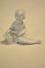 Statuina Capodimonte Bambino