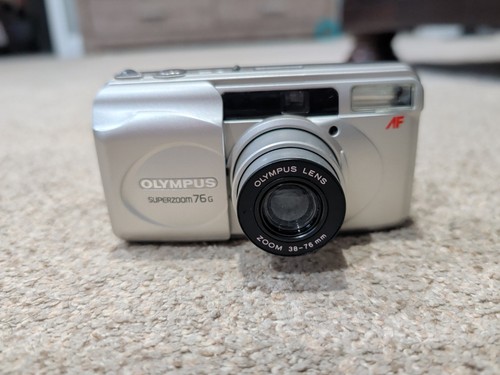 Olympus superzoom 76g - olympus,