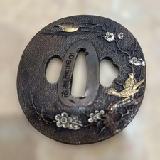 Tsuba in ferro con incisione