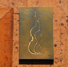 piastra violino ornamento