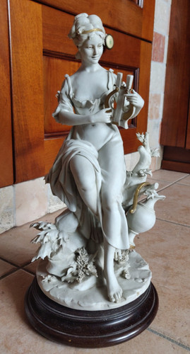 Scultura biscuit stile - in,