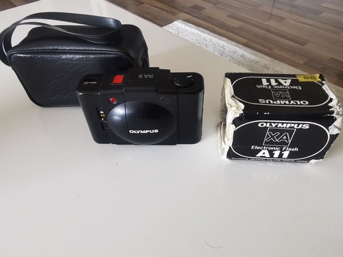 Olympus zuiko - xa, d.