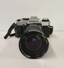 Fotocamera Olympus OM20 con ottica Tamron 35-135 1:3.5-4.2 tele macro