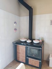 Termostufa a legna in ghisa Unirossi (eccellenti condizioni)