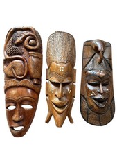 Tris di maschere tribali africane in legno intagliato