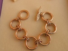 Bracciale firmato VICTORIA'S SECRET  metallo dorato