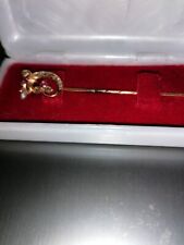 Spilla da cravatta antica in oro e pietre preziose