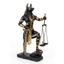 Statua Anubi Egizia che tiene