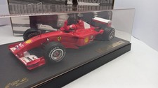 HW53956U1 Hot Wheels Ferrari F2001 M. Schumacher 1/18 con teca