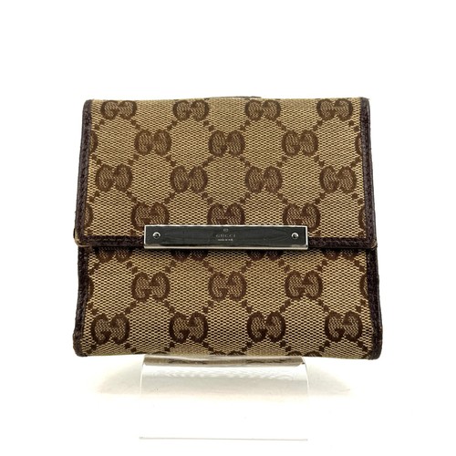 Gucci portafoglio bifold in - gucci, gg