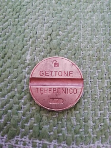 Gettone telefonico 7701 - gettone,