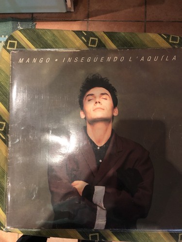 Mango inseguendo l - -,