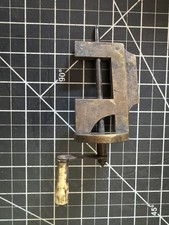 Antico morsetto manuale in