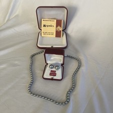 Set orecchini clip collana