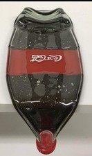 Scultura bottiglia Coca Cola