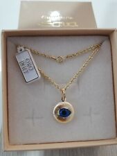 Collana e medaglia con occhio