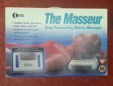 The Masseur "Shiatsu Massager"