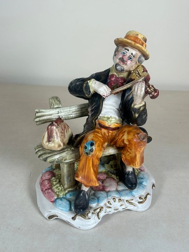 Statuina violinista porcellana