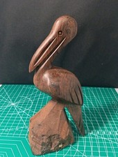 Cicogna pellicano intagliato a